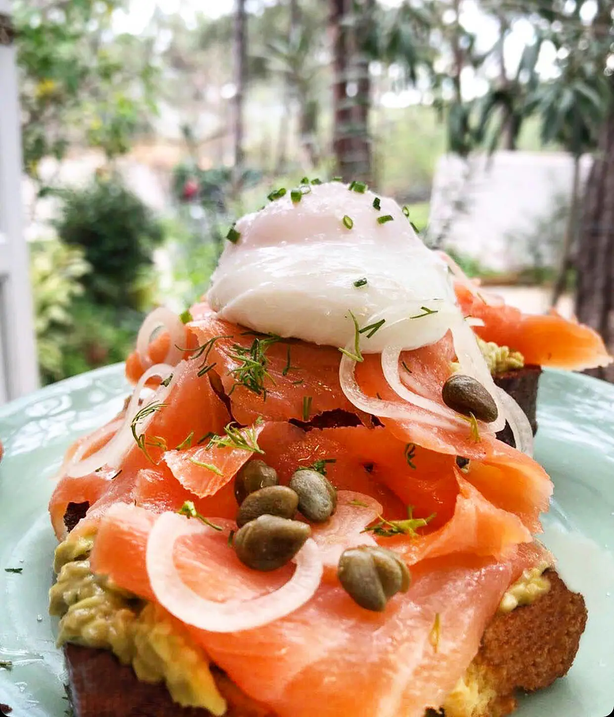 Sourdough toast with smoked salmon, capers and red onion
