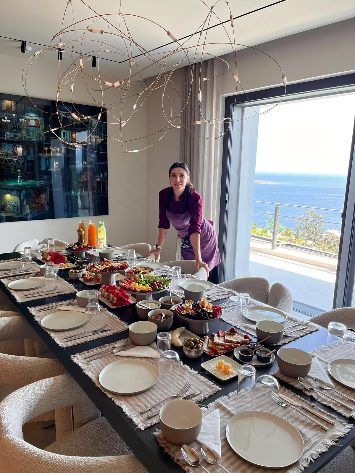 Dinner table in a villa with sea views
