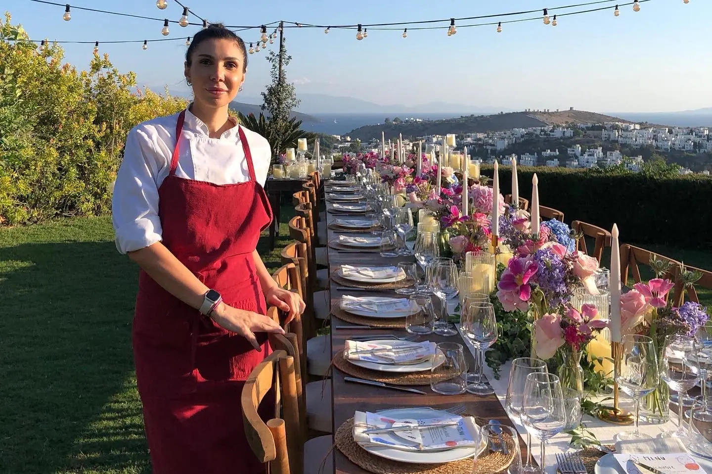 Long table dressed with flowers overlooking the sea in Bodrum
