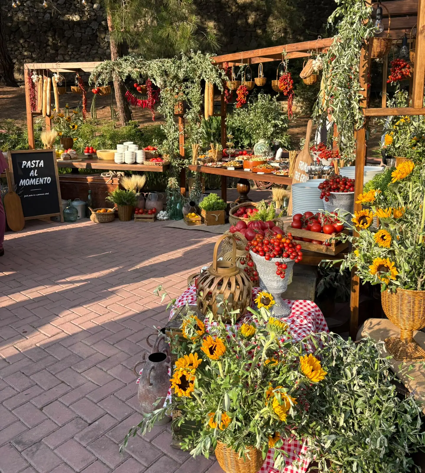 Grazing table with sunflowers and fresh produce