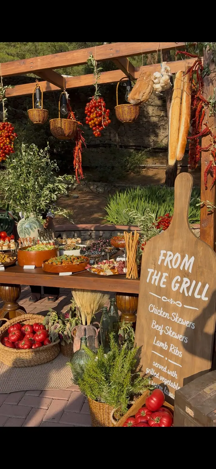 Outdoor grill station with a “from the grill” board